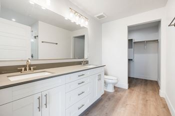 White bathroom with white toilet